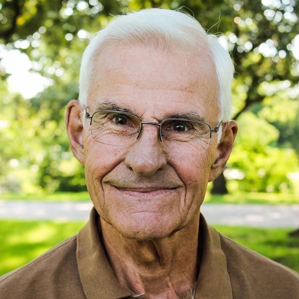 Head shot of Frank C Norton standing outside