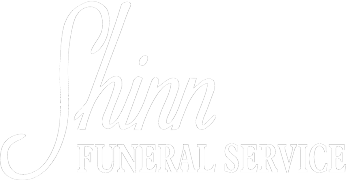 Shinn Funeral Service logo in light gray script and block lettering on a white background
