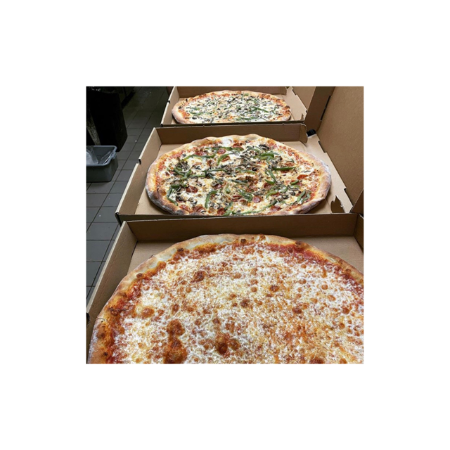 Three pizzas in cardboard boxes; cheese, asparagus and mushroom, and a green topping.