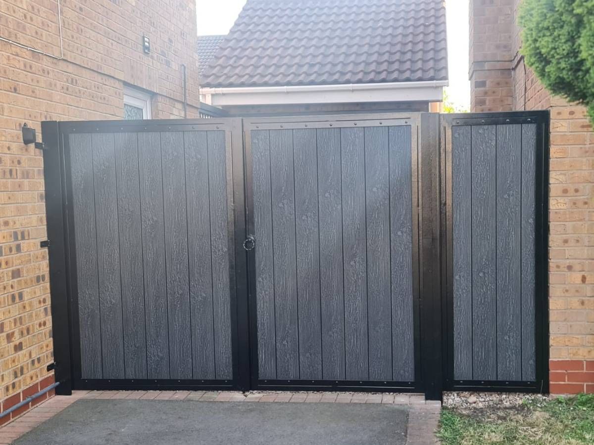 Nottingham Fencing composite fencing either side of the composite gate