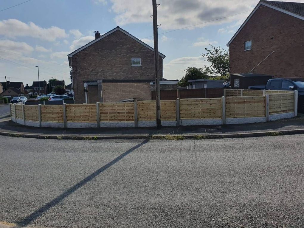A new timber fence along a corner front boundary in Selston where a hedge was removed