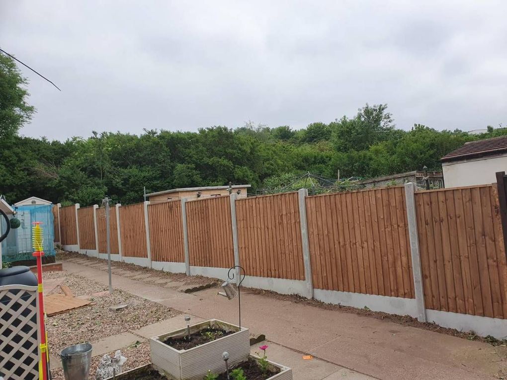 A new closeboard fence on concrete posts and gravel boards along a long Sneinton garden boundary