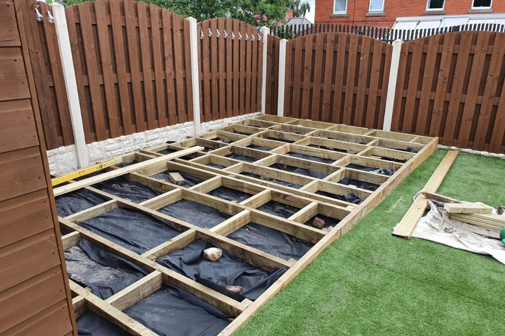 Decking frame being installed in a garden in Nottingham