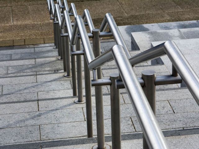 Chrome outdoor metal handrail by Nottingham Fencing