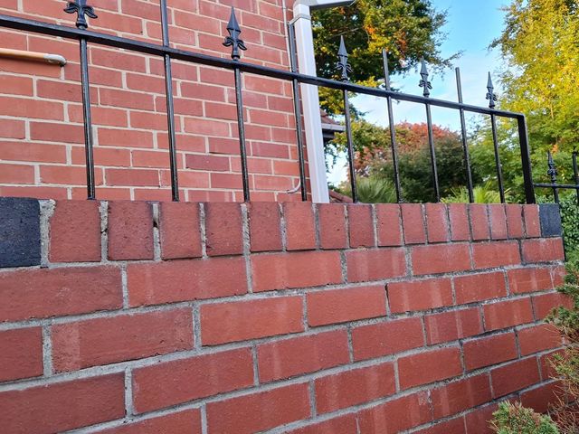 Metal garden wall top railings by Nottingham Fencing