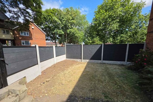 Anthracite composite fencing along a front garden boundary in Sutton in Ashfield