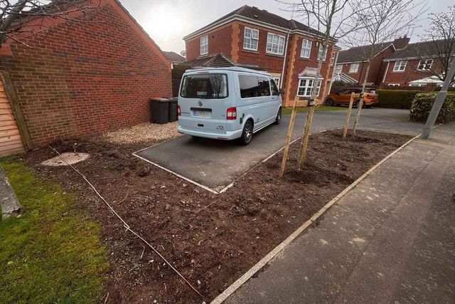 An open front garden and driveway in Long Eaton before metal railings were fitted
