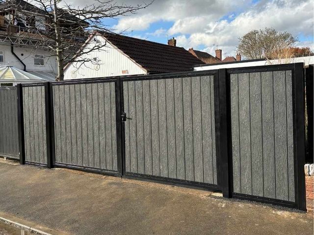 Anthracite grey composite driveway gates with matching composite fence panels either side