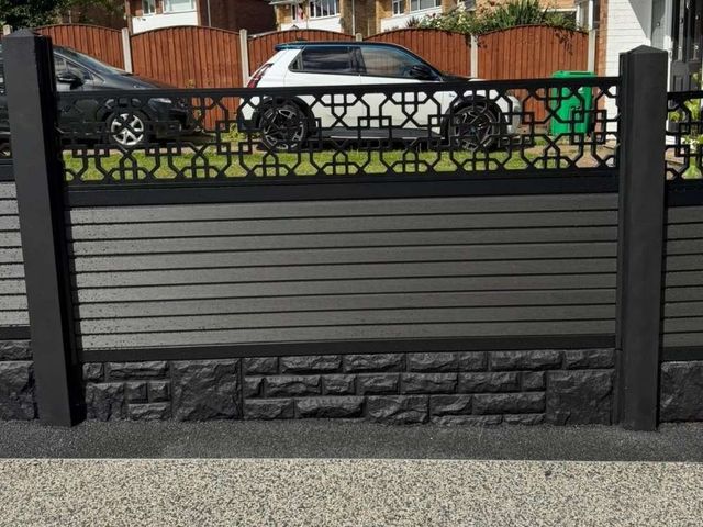 Close up of composite fence boards, black frame and rock-faced gravel board in Bulwell