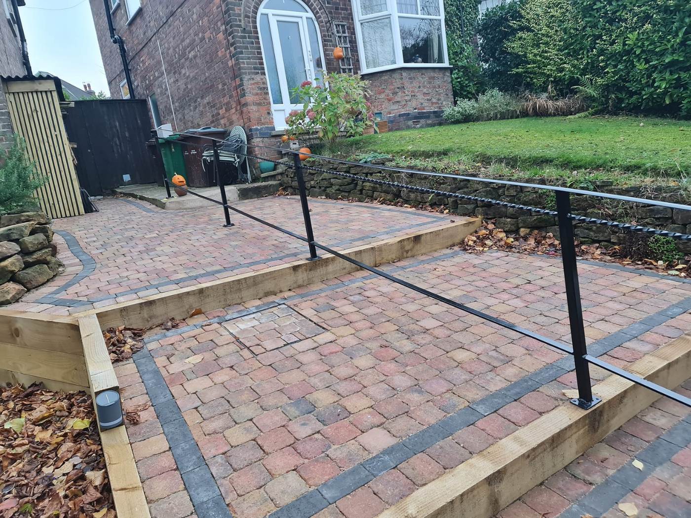 Nottingham Fencing metal handrail as a path divider