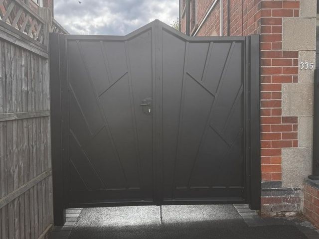 Solid steel driveway gates with angled panel detailing installed in Sherwood, Nottingham