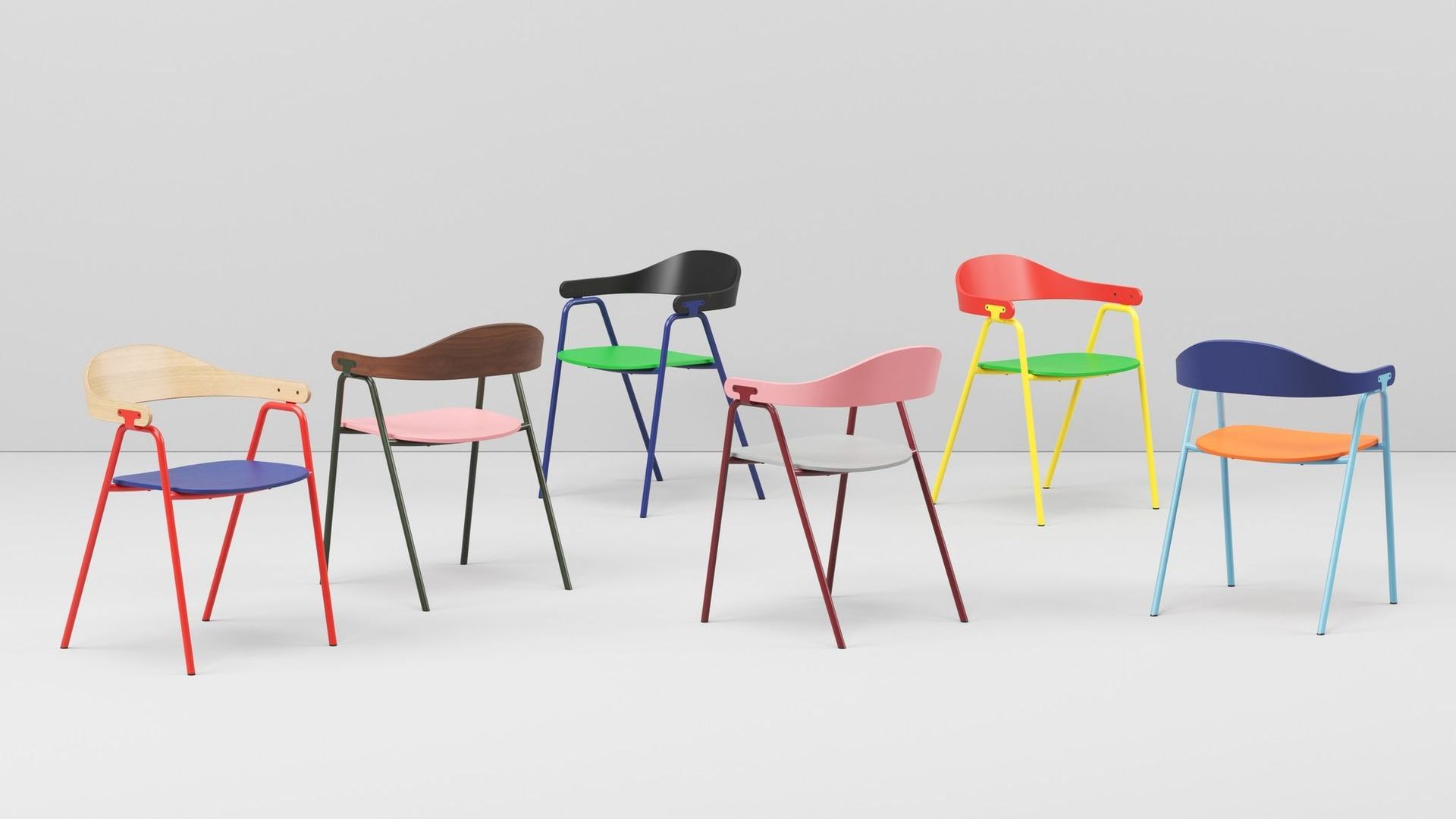 Colorful chairs: red, pink, black, brown, blue, yellow, with contrasting seat, back, and frame colors against a white background.
