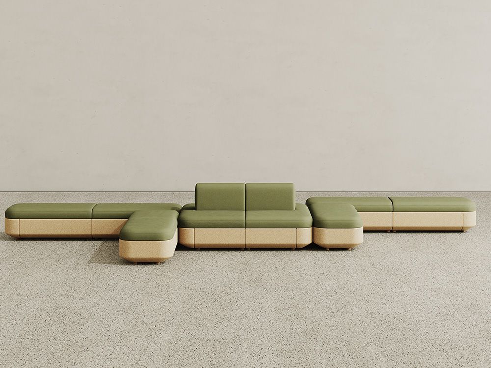 Tejo collection cork modular seating with cork base and sage green upholstery, configured as a bench seating system with some backed pieces and some backless