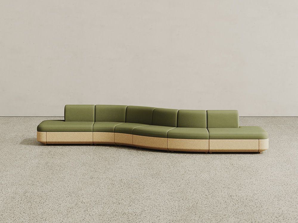 Tejo collection cork modular seating with cork base and sage green upholstery, configured as a curved bench seating system with backs