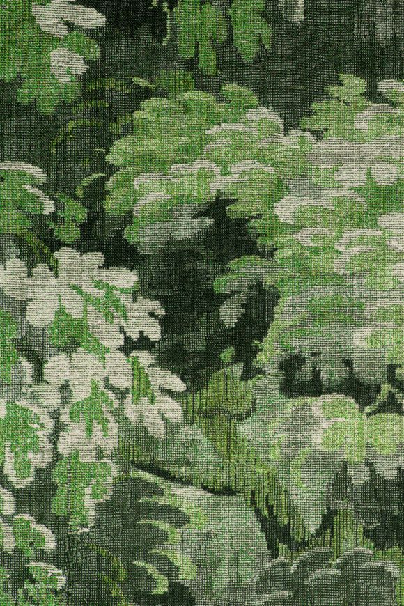 Green and white leafy foliage, woven texture.