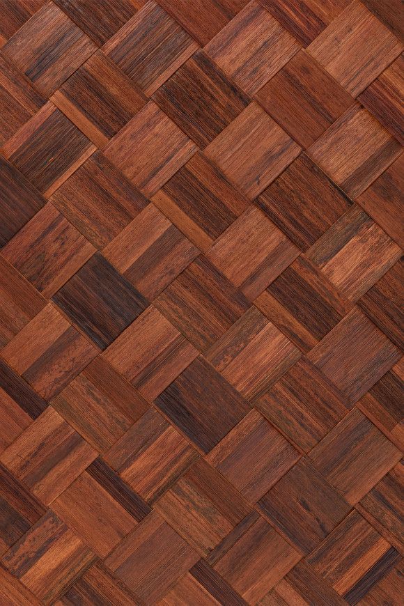 Interlocking pattern of dark, reddish-brown  sustainable banana leaf woven panels