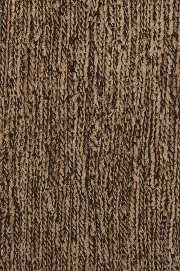 Brown and black woven textile with vertical, textured pattern.
