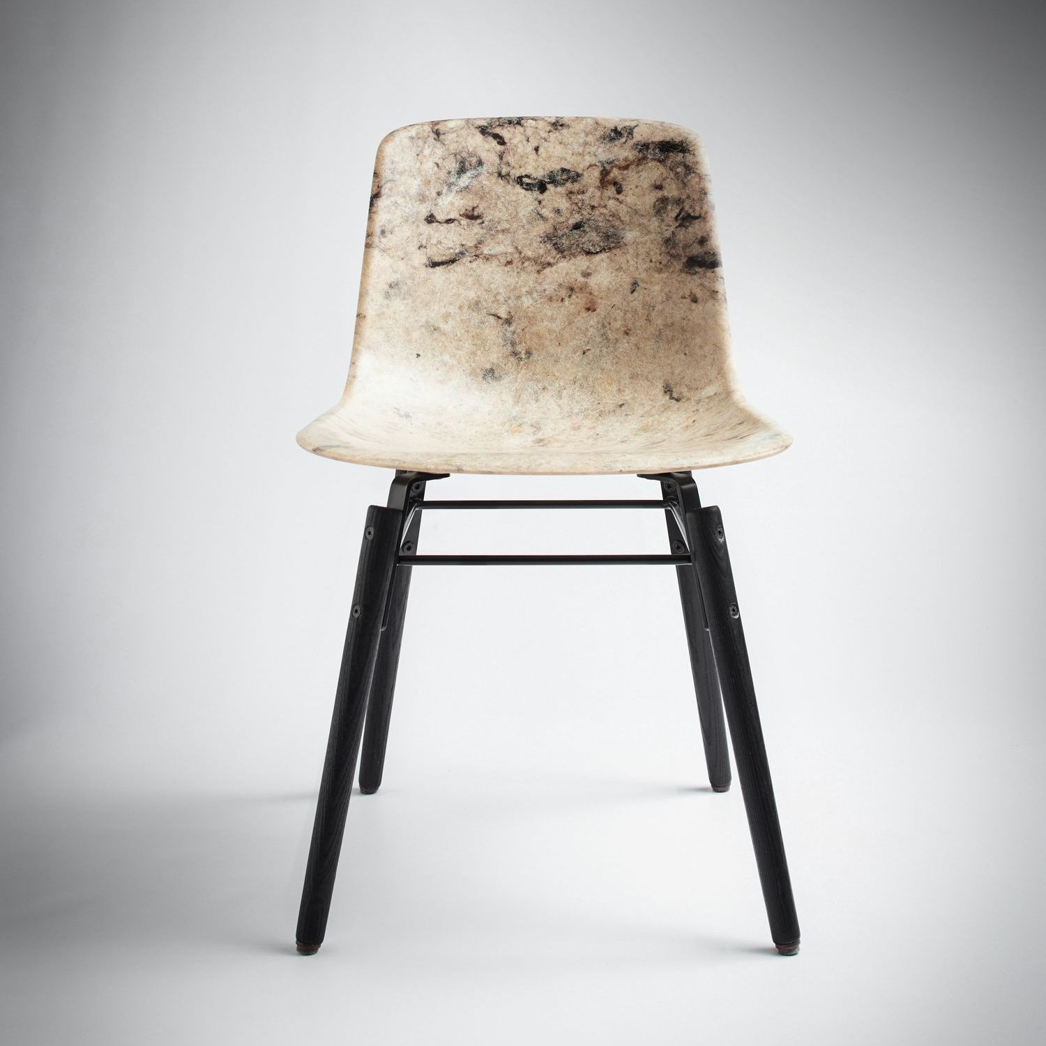 Hembury chair in white with black legs facing front.