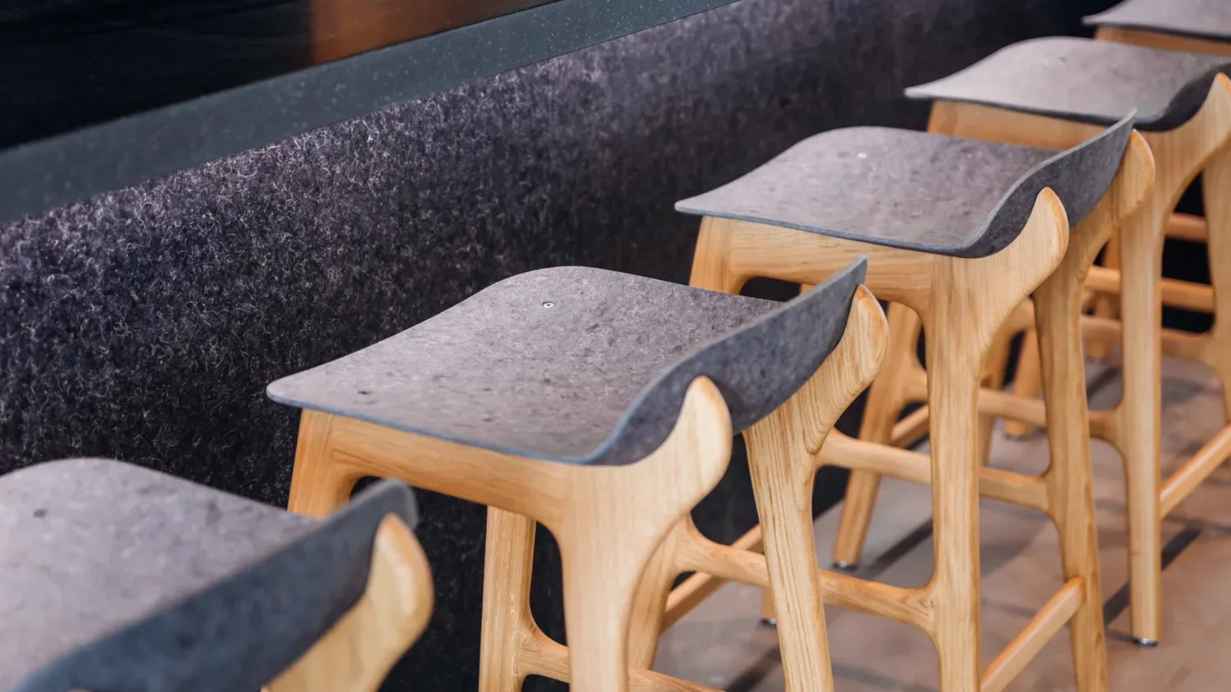 recycled veneer surfaces in stools made from old denim 