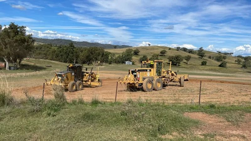Two Yellow Grader On Field — Earthmoving In Upper Manilla, NSW