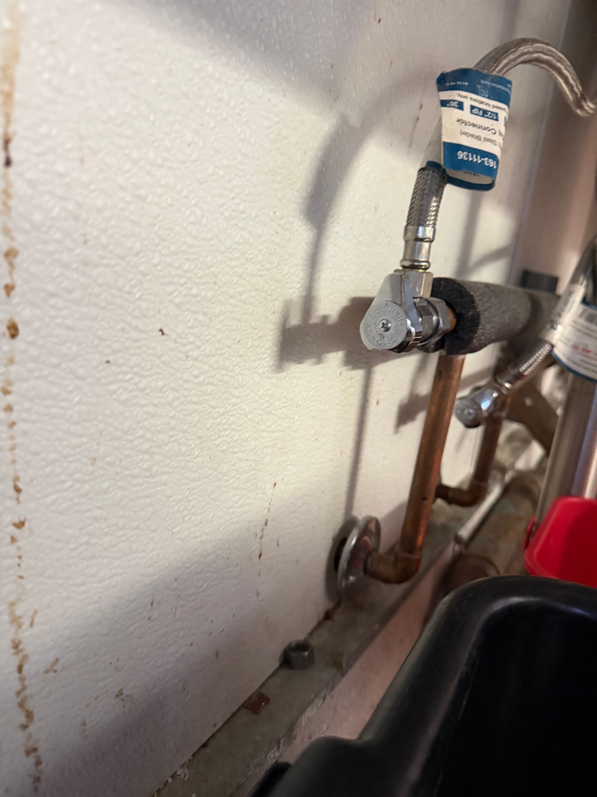 Quarter turn angle stop connected to a water supply line