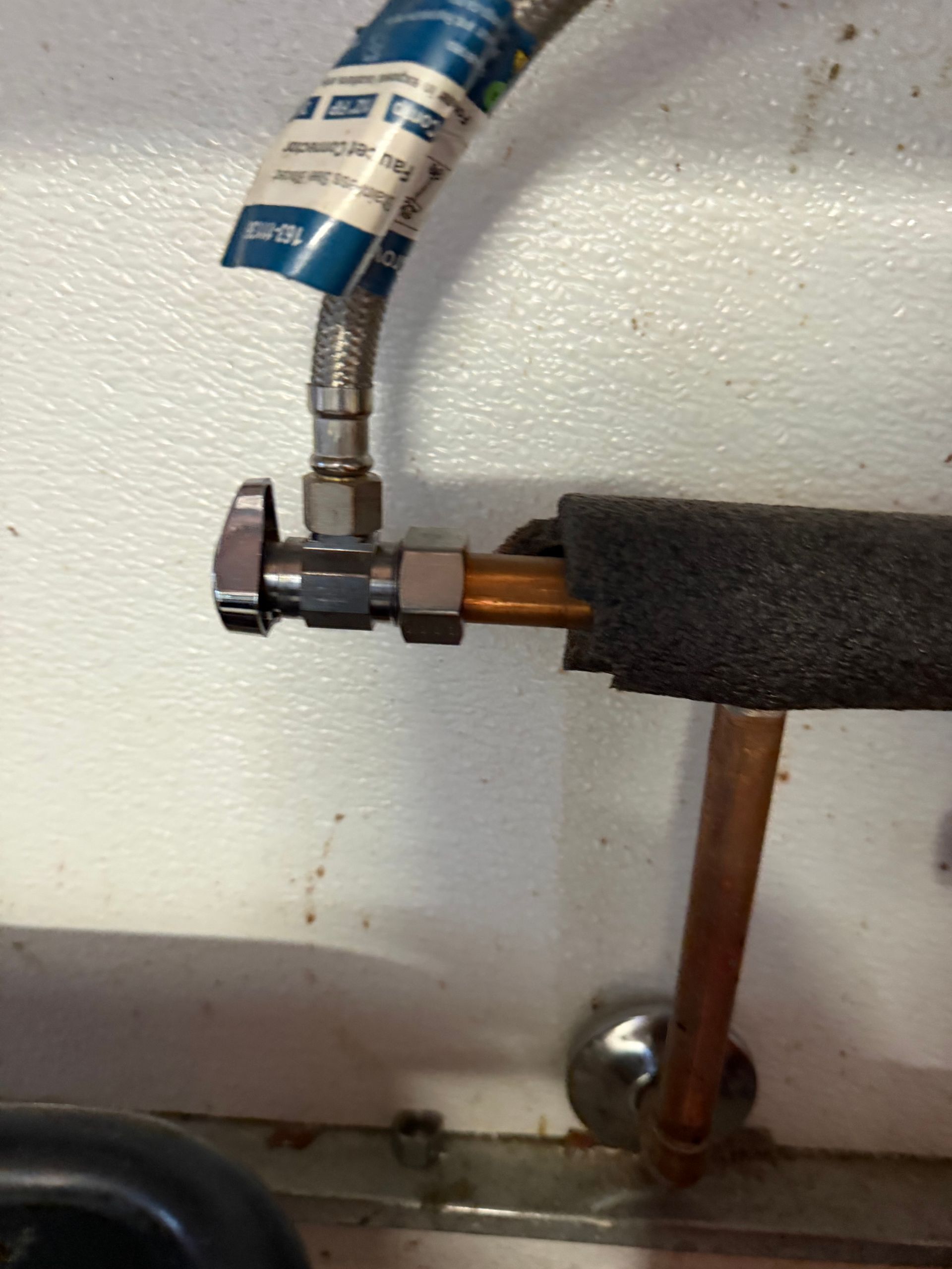 Angle stop shut off valve under a bathroom sink