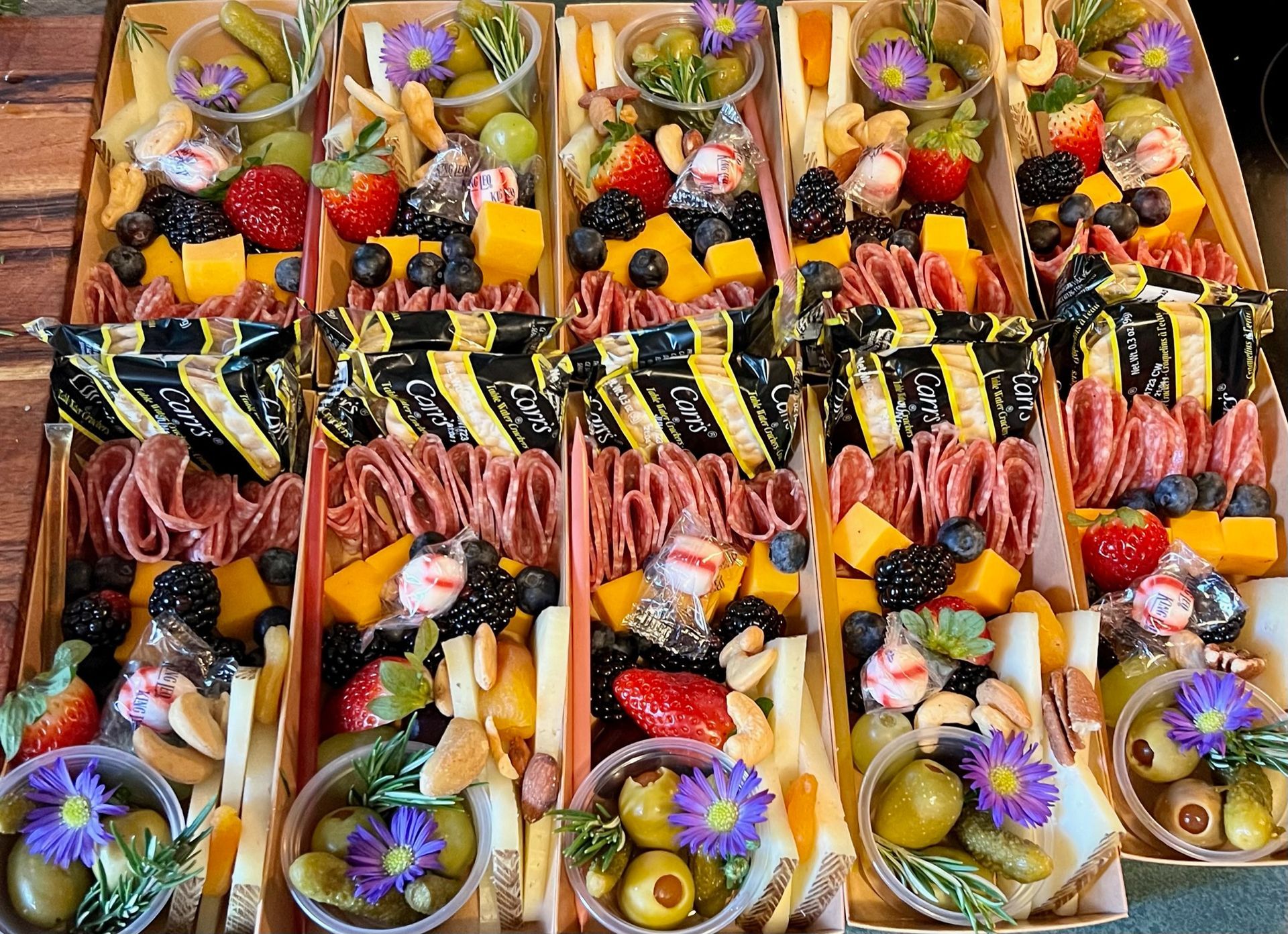 There are many different types of food in the boxes.