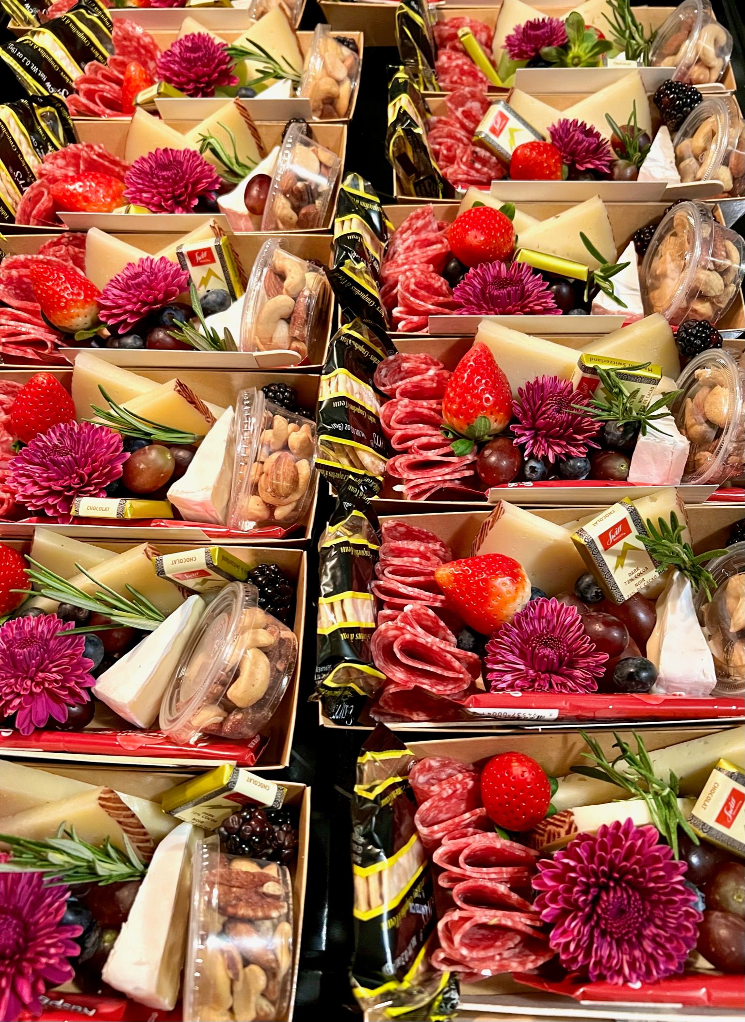 A bunch of boxes filled with different types of food.