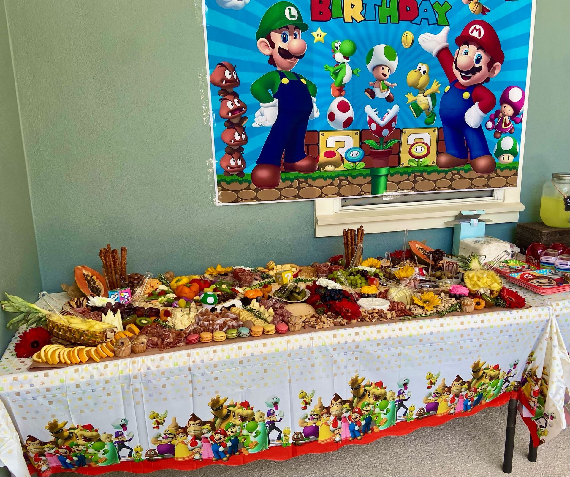 A table set up for a mario themed birthday party