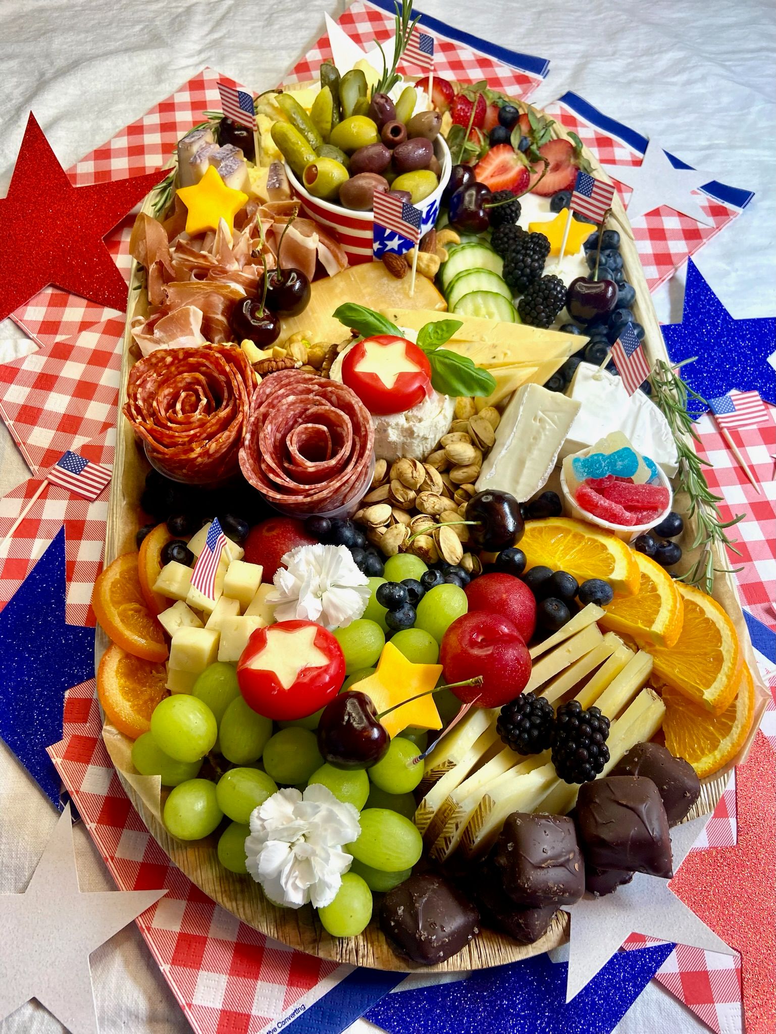 A large platter of food is sitting on a table.