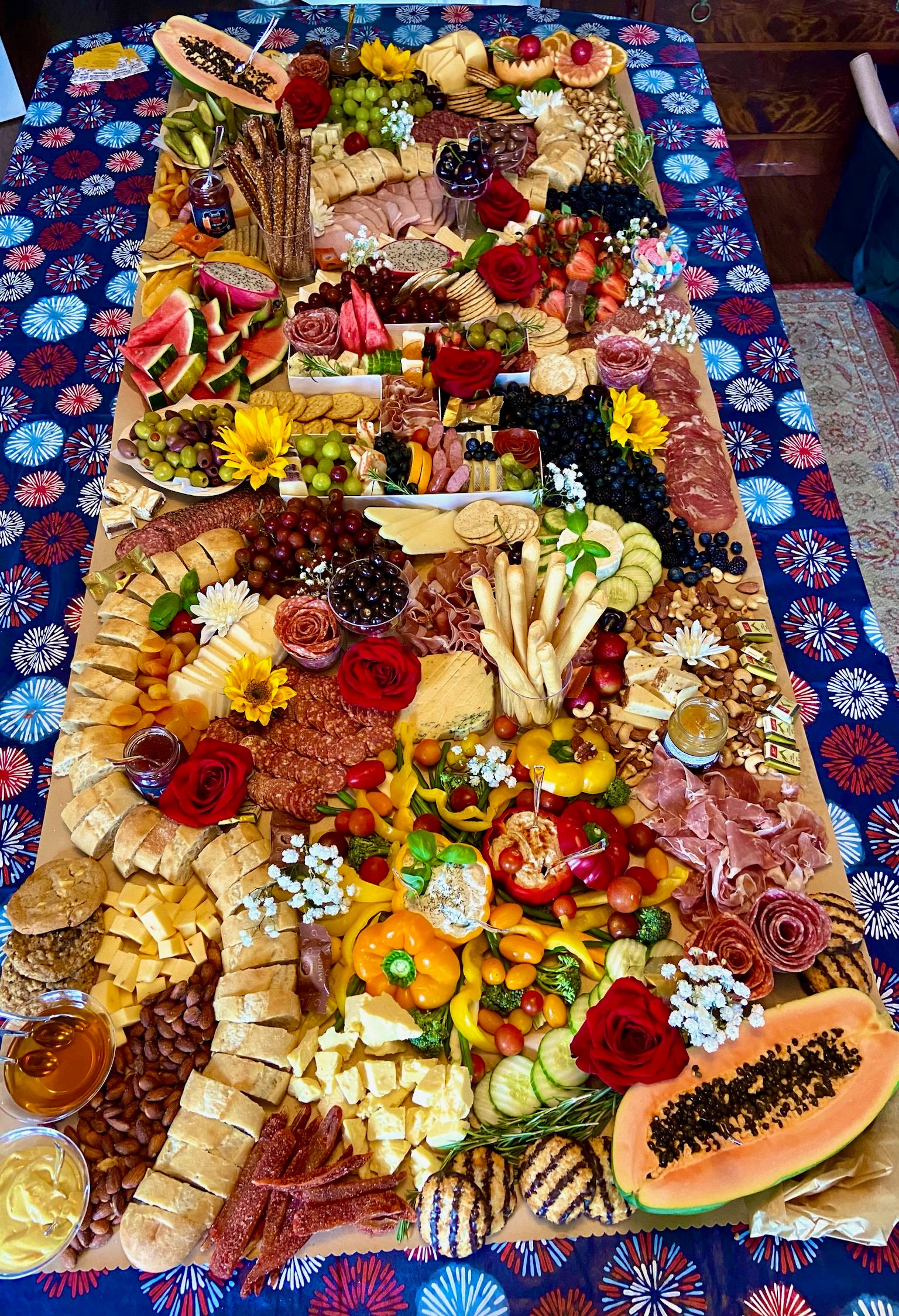 A large tray of food is sitting on top of a table.