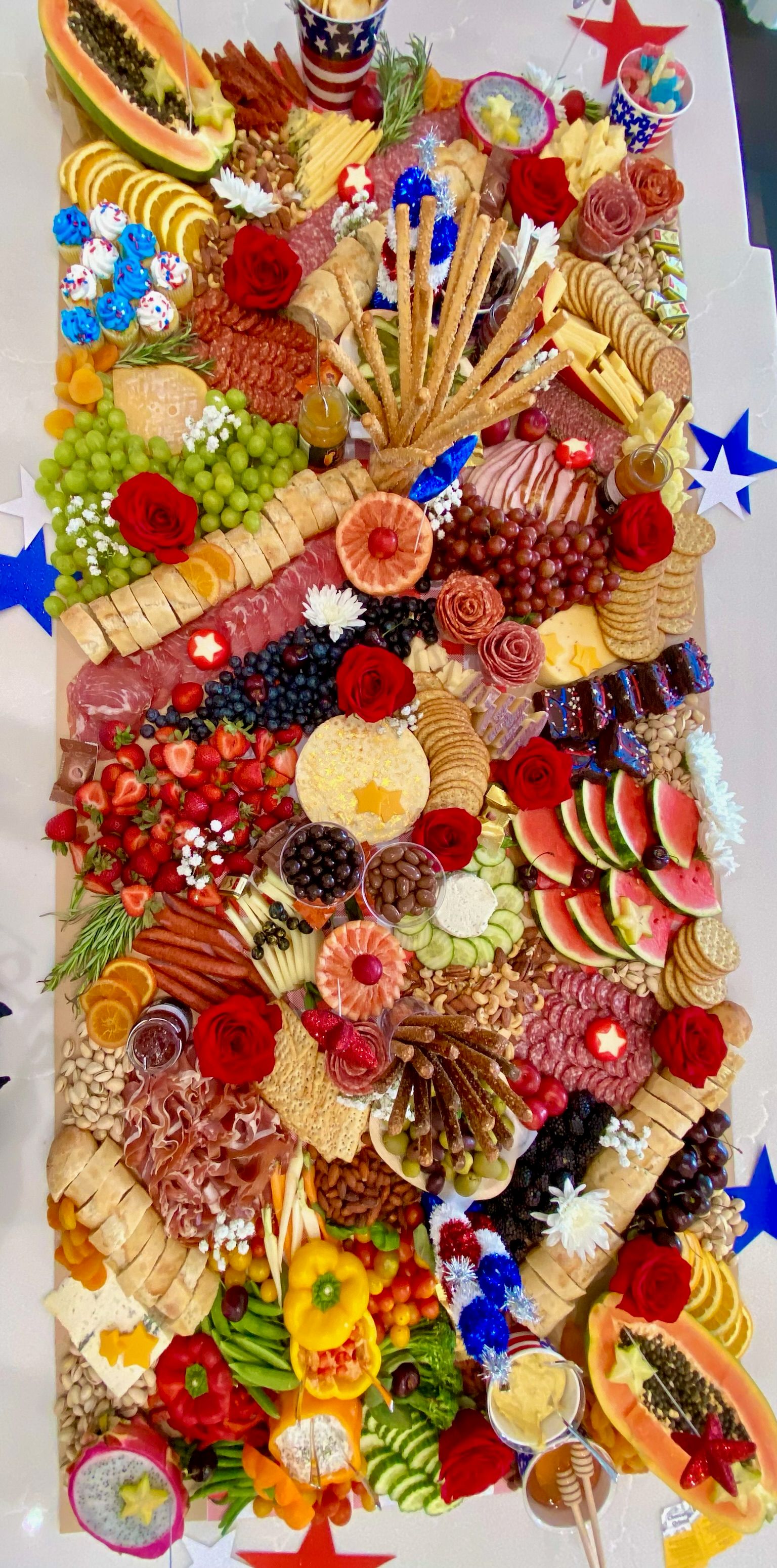 A large platter filled with lots of different types of food.