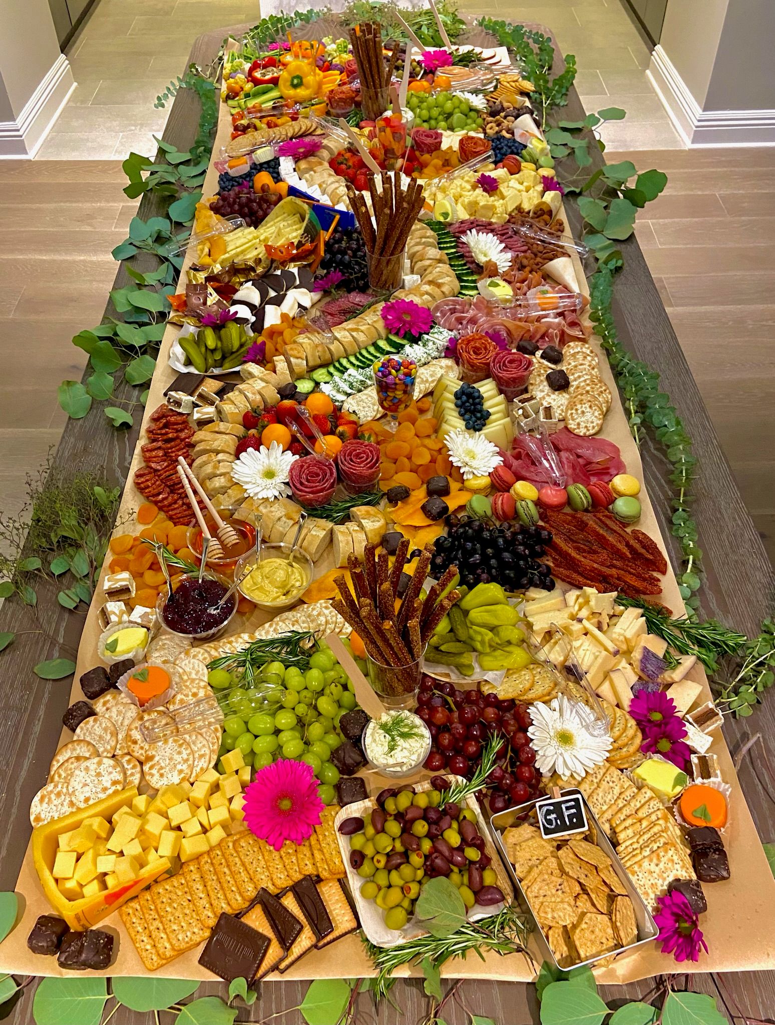 A long tray filled with lots of different types of food.