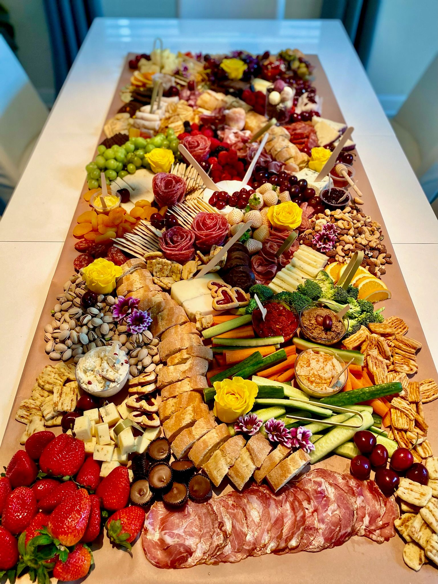 A large platter of food is sitting on a table.