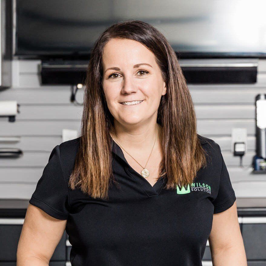 A woman wearing a black shirt with the word williams on it