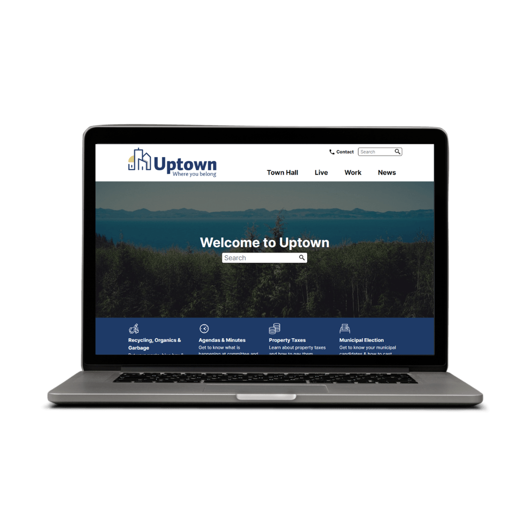 A laptop computer is open to a website that says welcome to uptown.