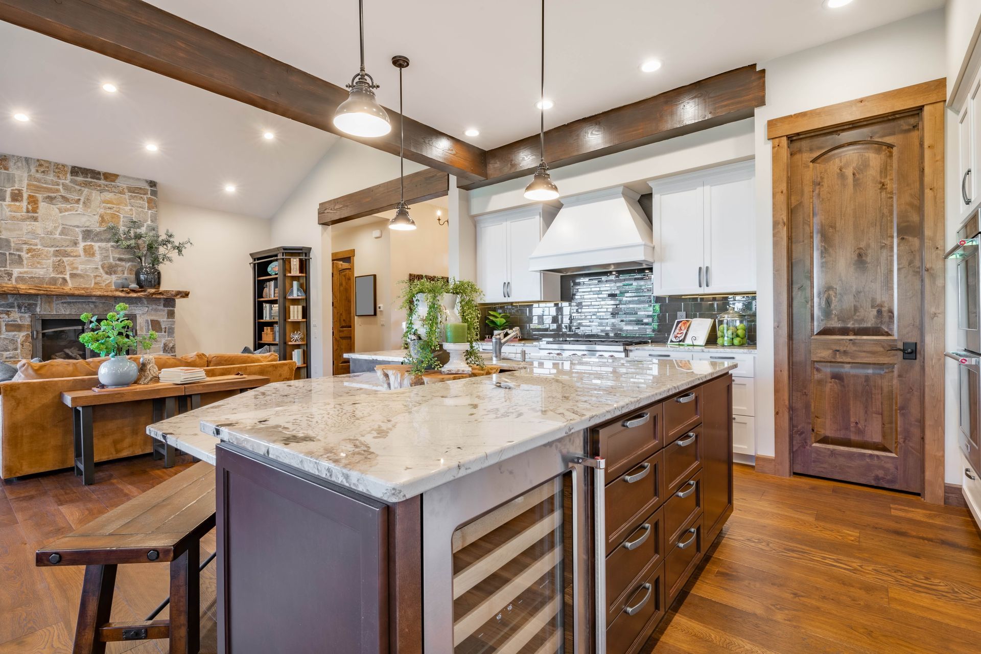 there is a large island in the middle of the kitchen