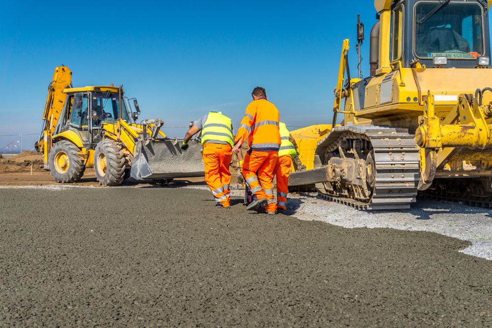 A Group of Construction Workers on a Construction Site — Ensbey Earthmoving in Maroochydore, QLD