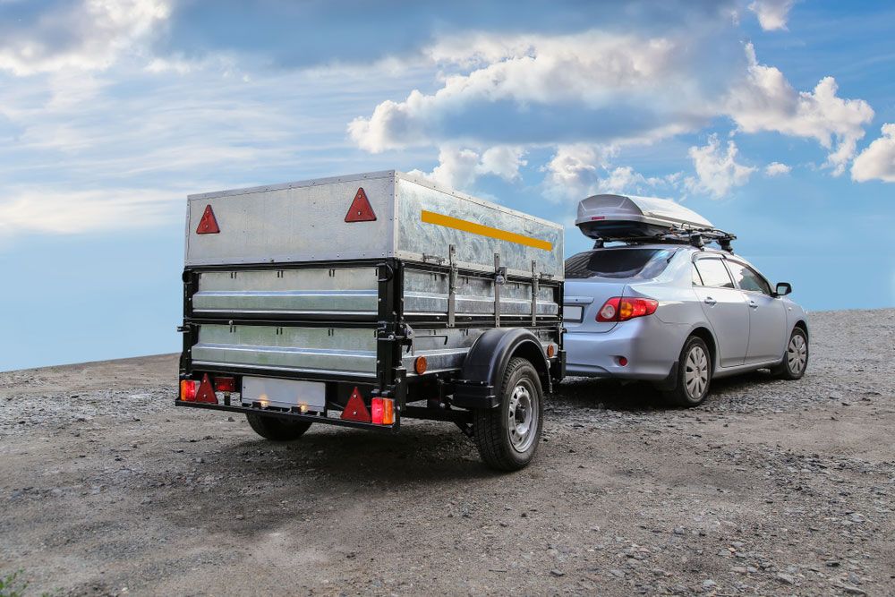 Car with trailer road sky horizon — Tow in Cobar, NSW