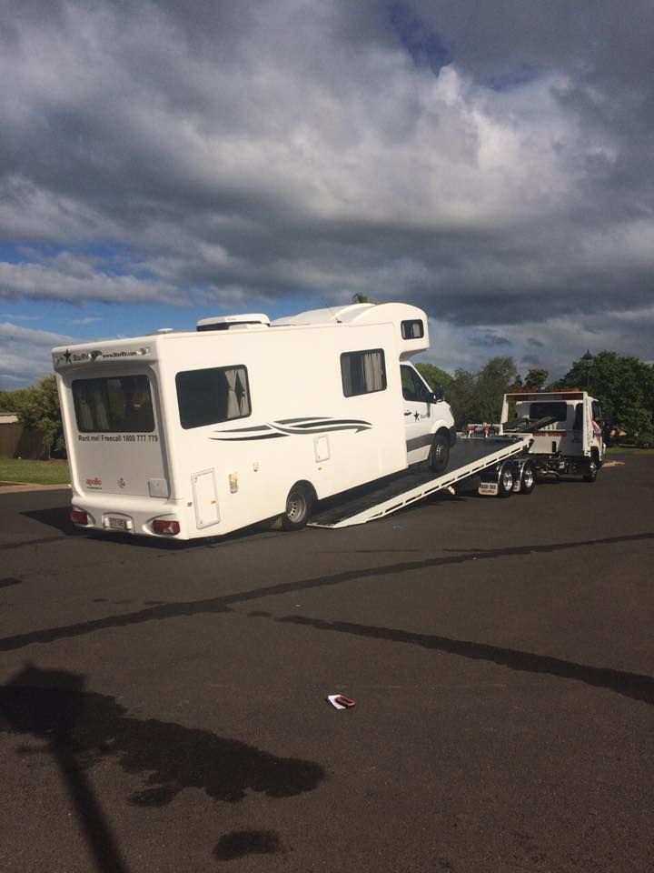 Man making final connection before towing his caravan — Tow in Dubbo, NSW