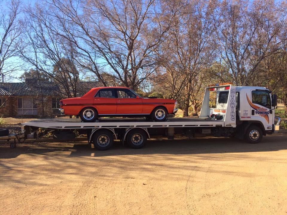 Car carrier trailer with car — Tow in Dubbo, NSW