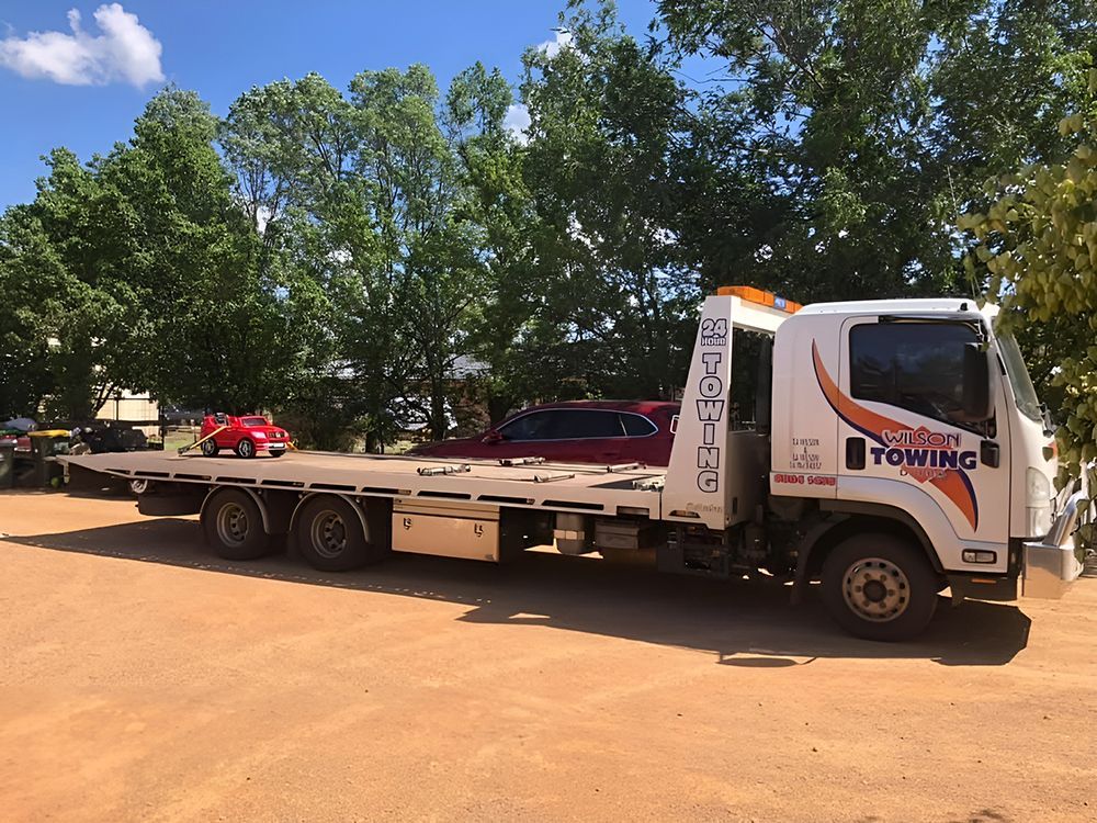 A White Tow Truck with an Empty Flatbed — Tow in Dubbo, NSW