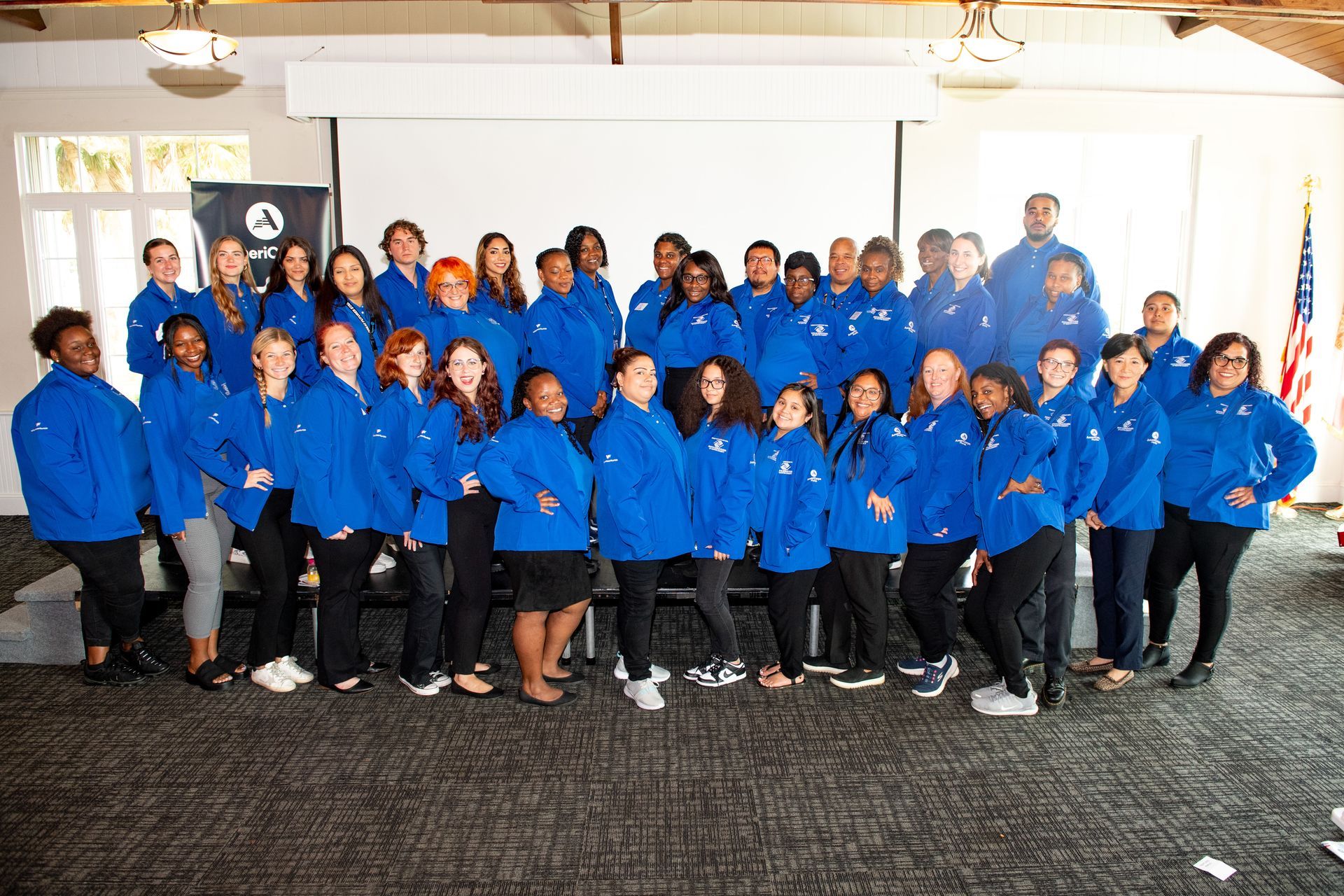 Group of Volunteers in blue