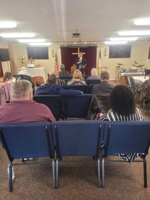 Man Giving a Sermon to a Group of People in a Church — Downingtown, PA — Harvest Worship Center