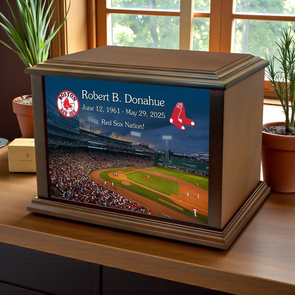 Memorial baseball display box with Robert B. Donahue nameplate and Cardinals logo on a wooden table