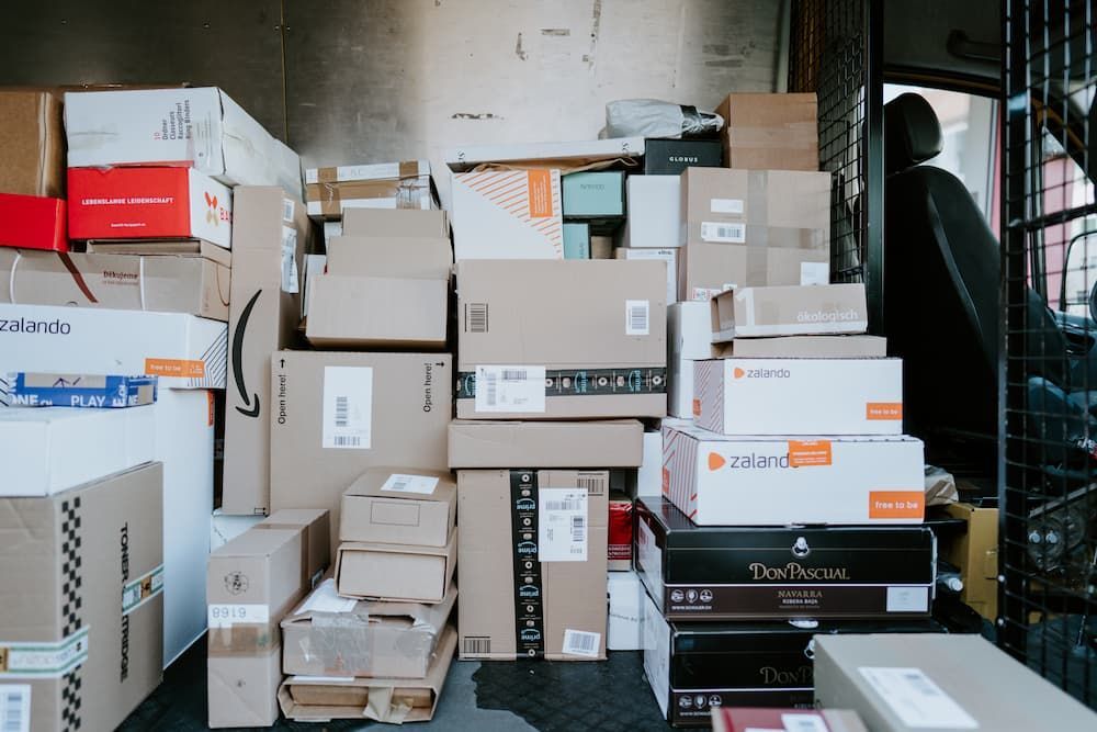 Boxes Stacked Inside a Vehicle — Griffin Distributors In  Mount St John, QLD