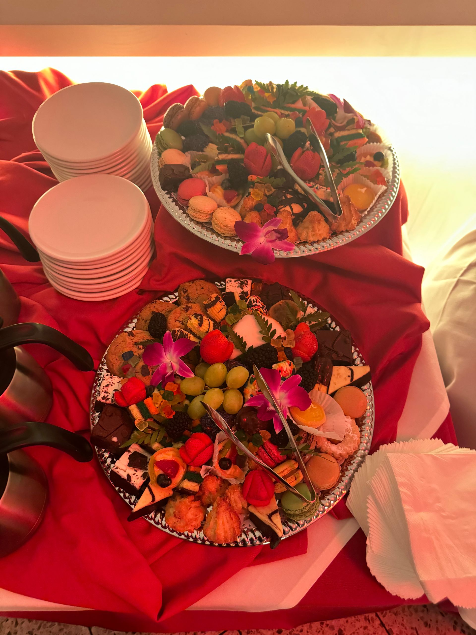 Two plates of food are sitting on a table.