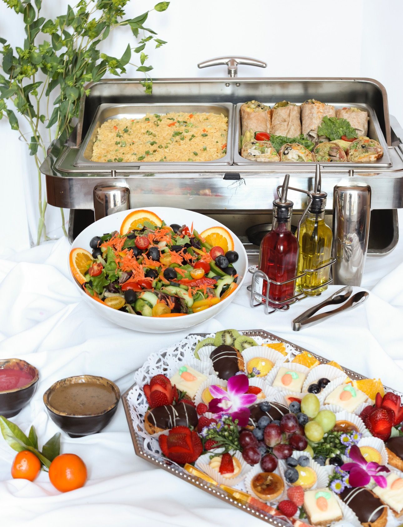 EQX City Catering Event Space at Rockefeller Center - There are many different types of food on the table.