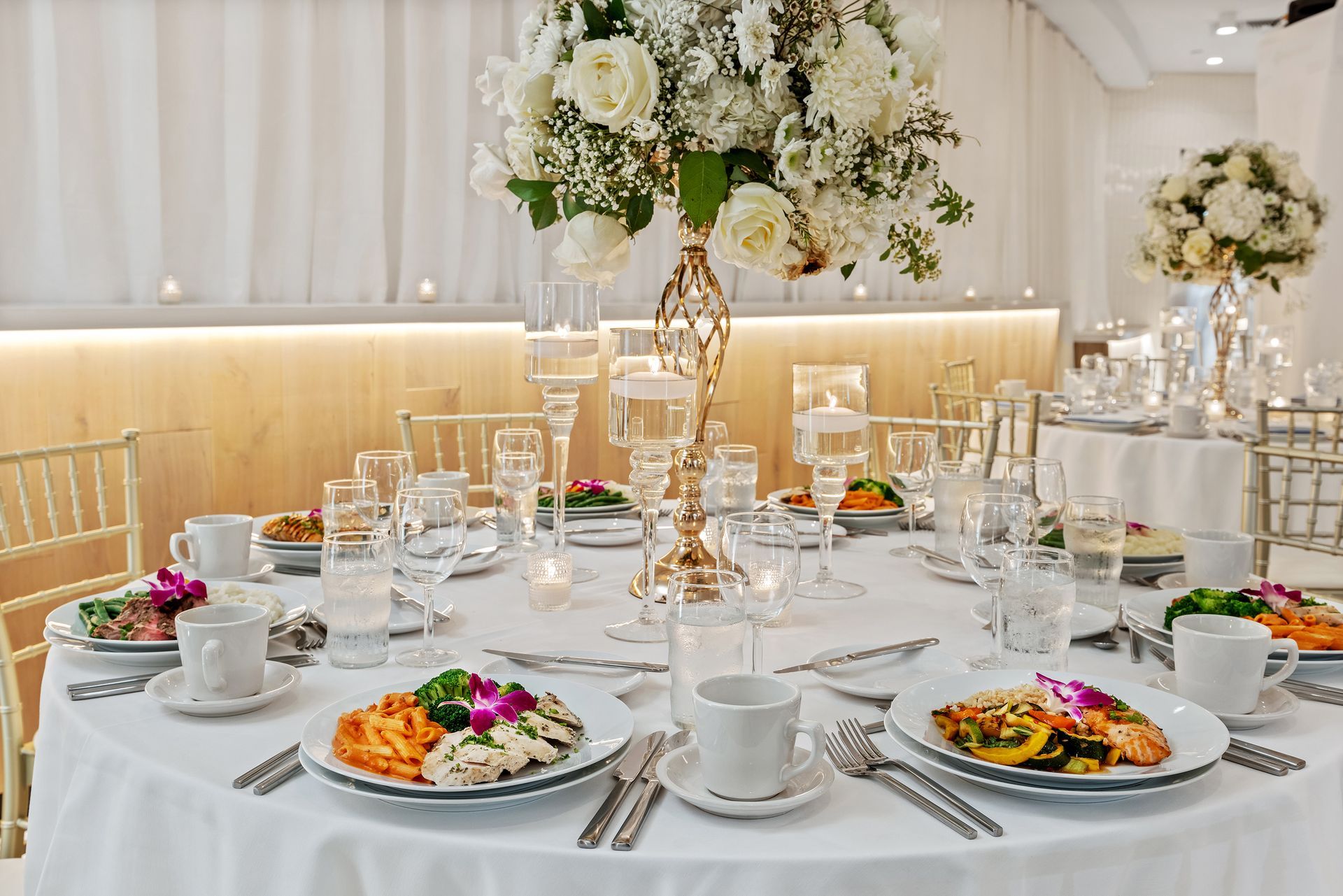 A table topped with a variety of desserts and cupcakes.