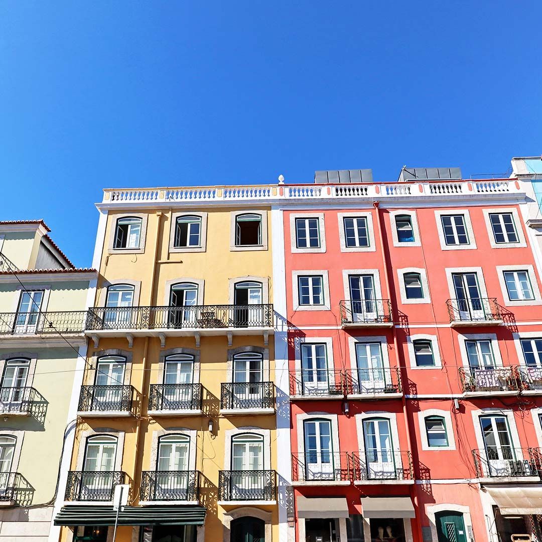 Showcase of Lisbon Real Estate Expansive vista of Lisbon's picturesque architecture and lively neighbourhoods.